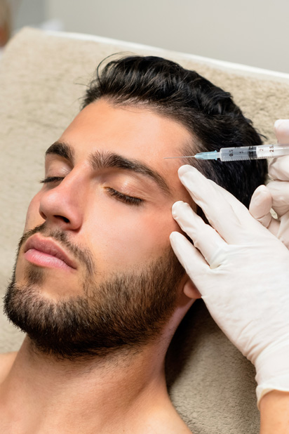 relaxed youthful man face injections